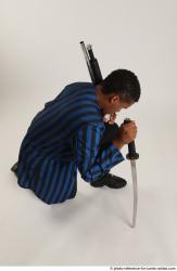 Garson KNEELING POSE WITH KATANA AND SHOTGUN
